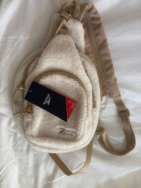 NWT | Reebok Sherpa Convertible Sling Backpack Cream Tan 2-in-1 Crossbody Bag